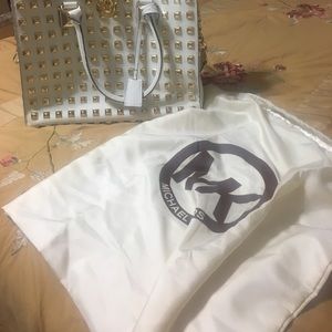 MK..White and gold large hand bag.